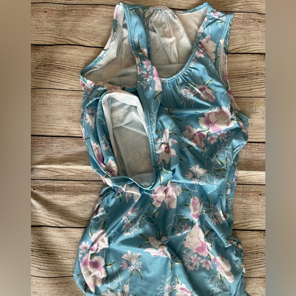 Very gently used. Blue floral Women's Nursing Top. Size small. - Picture 3 of 7